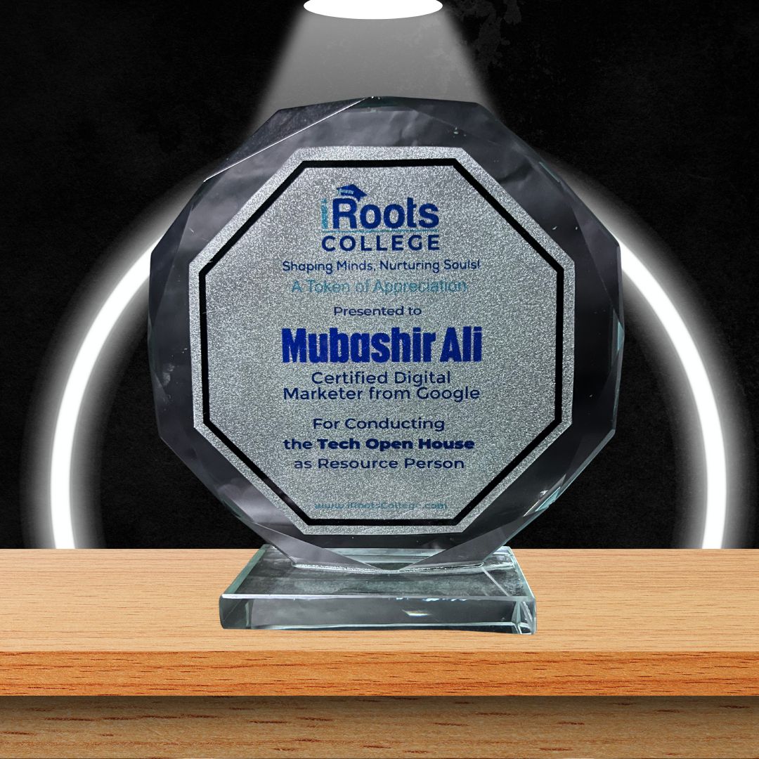Mubashir ali received appreciation shield from IRoots College, Karachi Pakistan